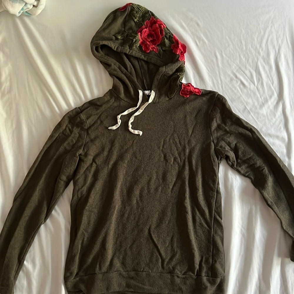 Army green sweatshirt with rose detail on hood